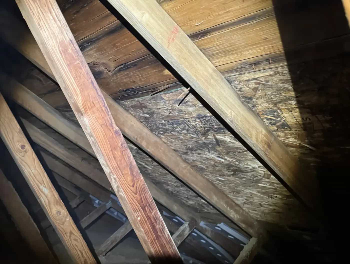 Attic ventilation installation on a Michigan roof