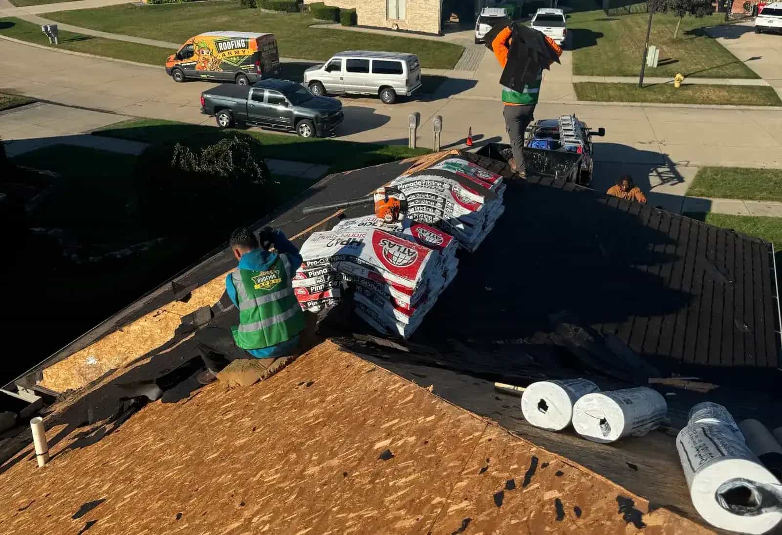 New roof replacement being installed on a Michigan home New roof replacement being installed on a Michigan home