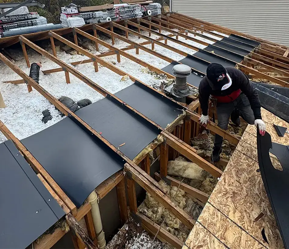 baffles in an open attic to help guide airflow up to the ridge