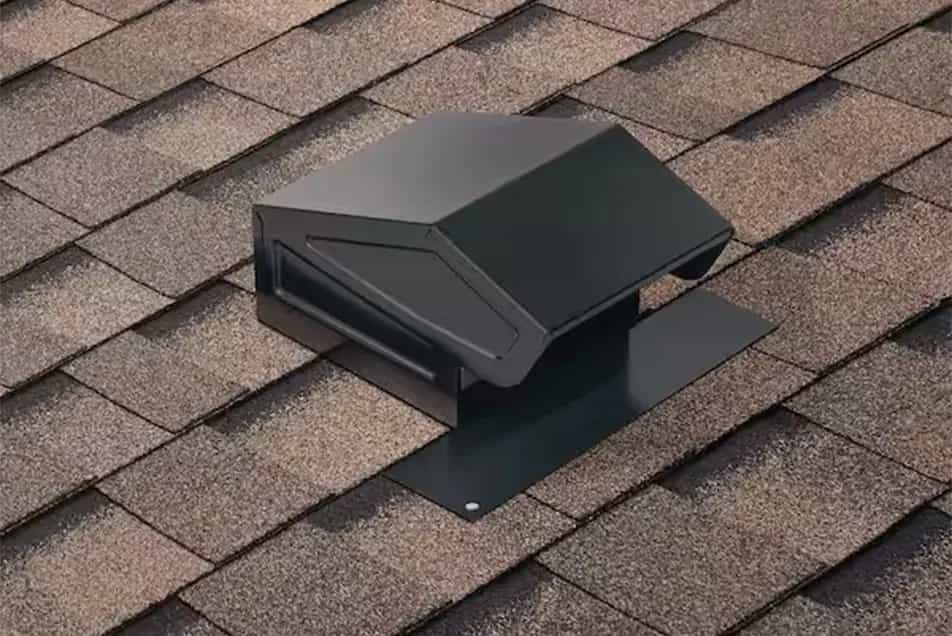 black metal bathroom vent on an asphalt shingle roof
