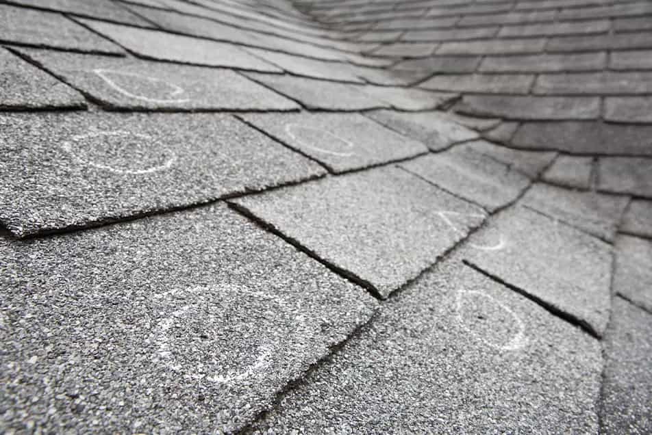 Hail Bruising - SE Michigan Storm Damage Roofing hail damaged shingles with chalk circles