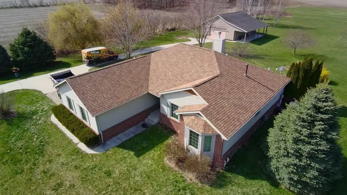 Roof Replacement at 6921 Hollow Corners Road, Almont by Roofing Army Roof Replacement in Almont with Atlas Morning Harvest shingles — completed by Roofing Army