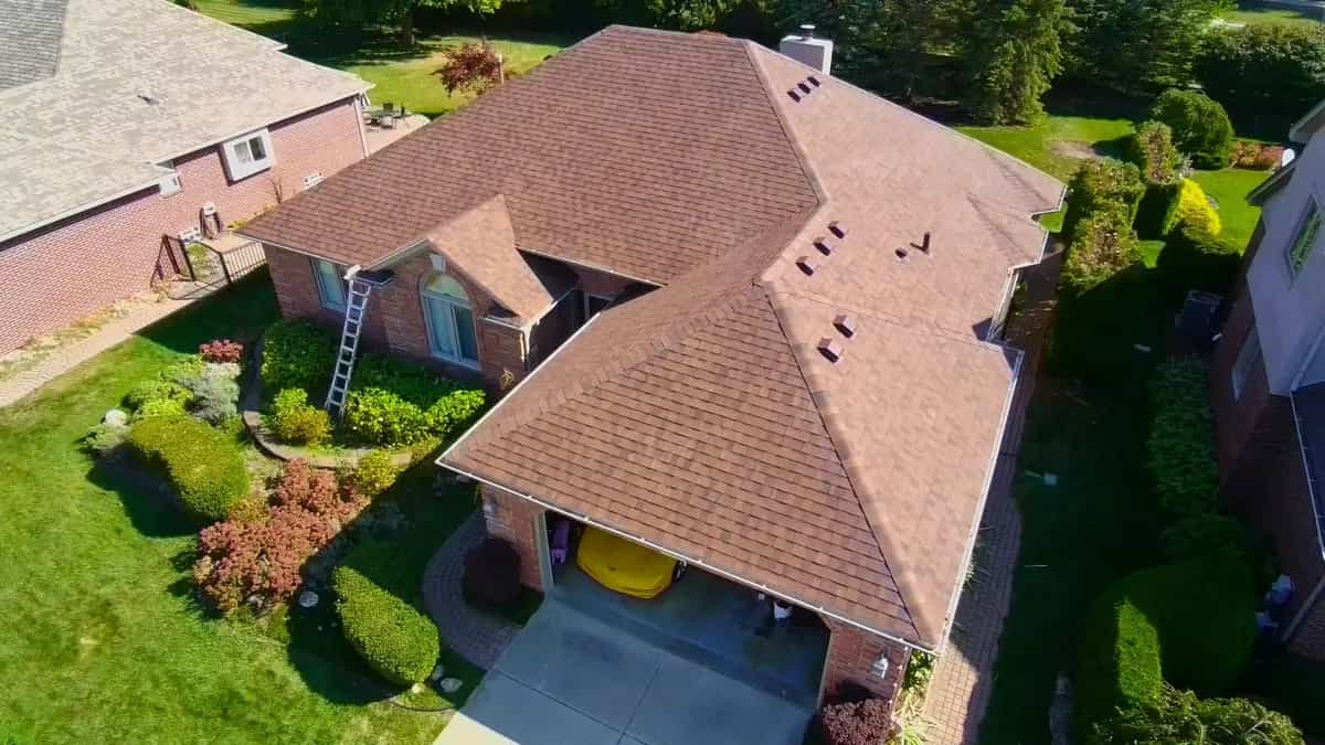 Roof Replacement at 48282 Sherringham Drive, Macomb by Roofing Army Roof Replacement in Macomb with Atlas Burnt Hickory shingles — completed by Roofing Army