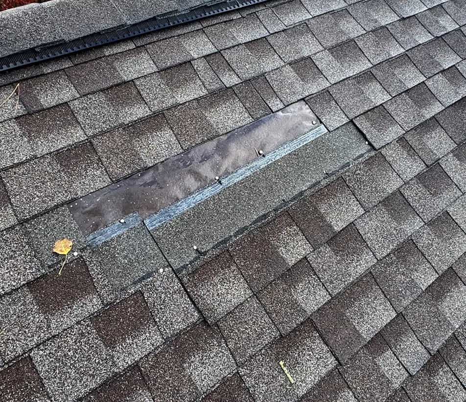 Missing Shingles - SE Michigan Roof Repair Services missing asphalt shingle on a michigan roof
