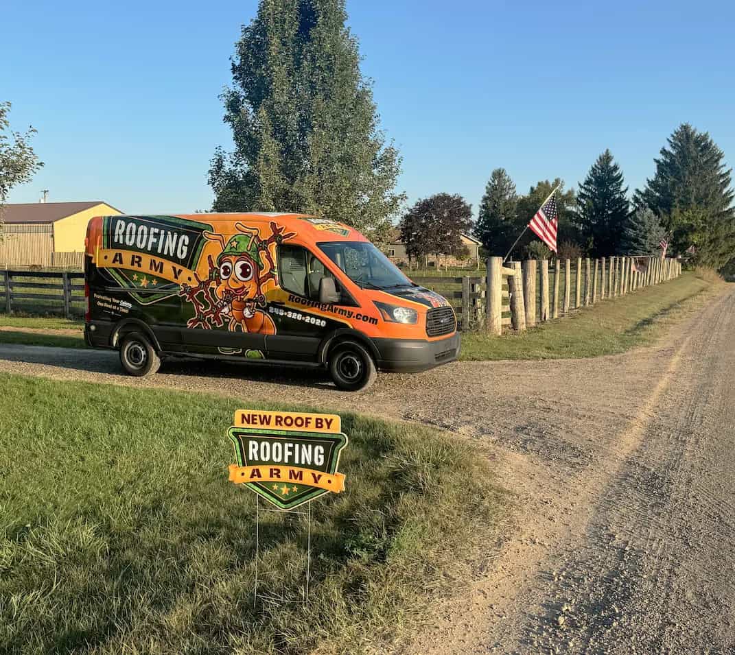 Why Choose Roofing Army - SE Michigan Roofing Contractor Roofing Army van parked at a home in Rochester, MI during a roof replacement