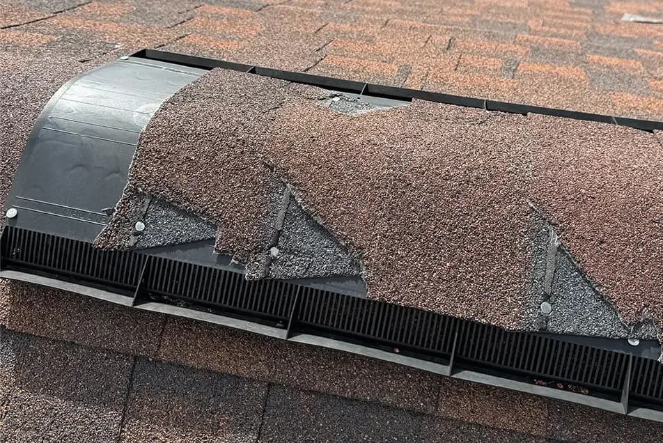 ridge cap shingles broken from a storm