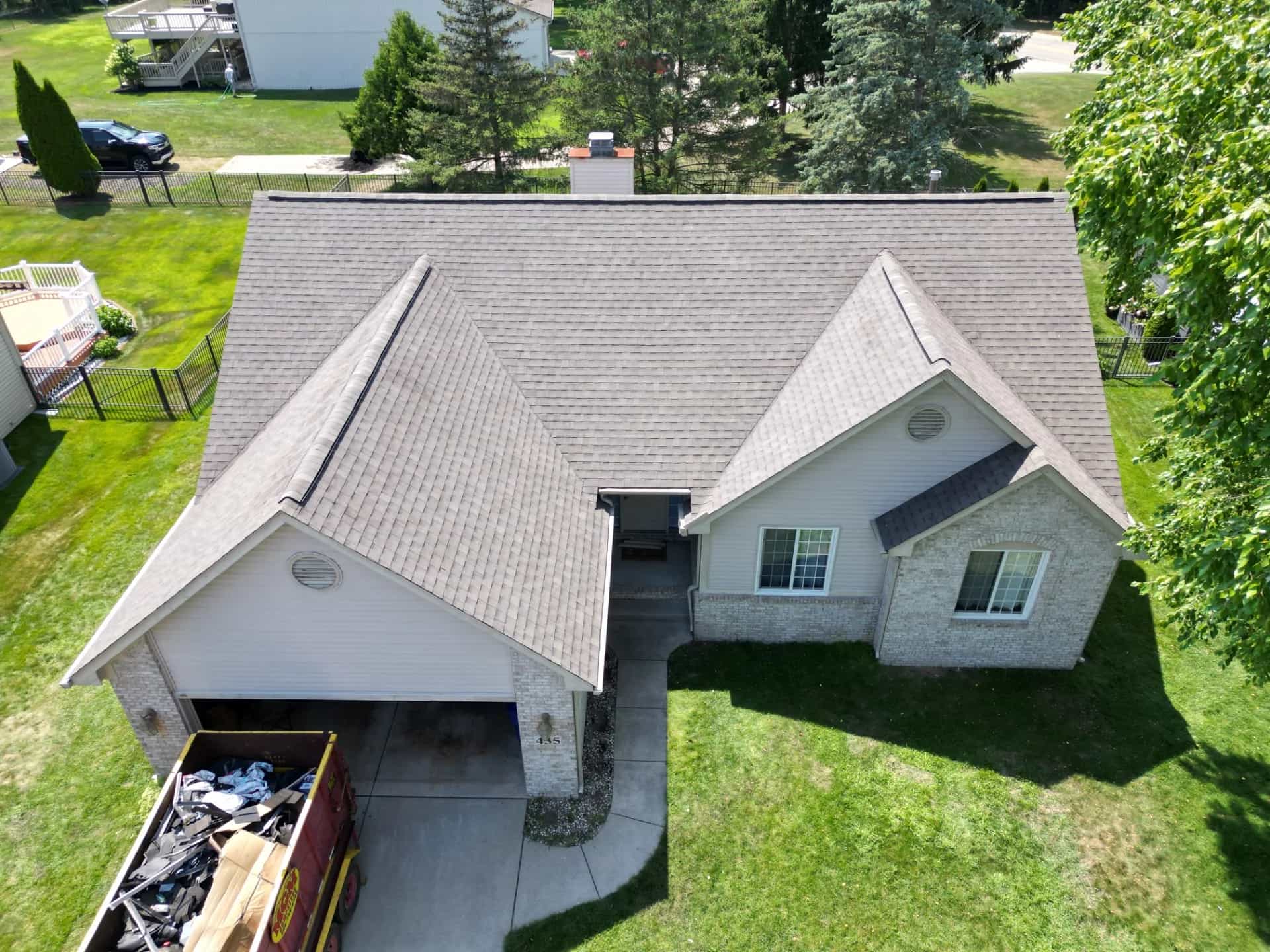 Roof Replacement at 435 Pinecliff Court, Waterford Township by Roofing Army Roof Replacement in Waterford Township with Atlas Pinnacle Pristine Weathered Wood shingles — completed by Roofing Army